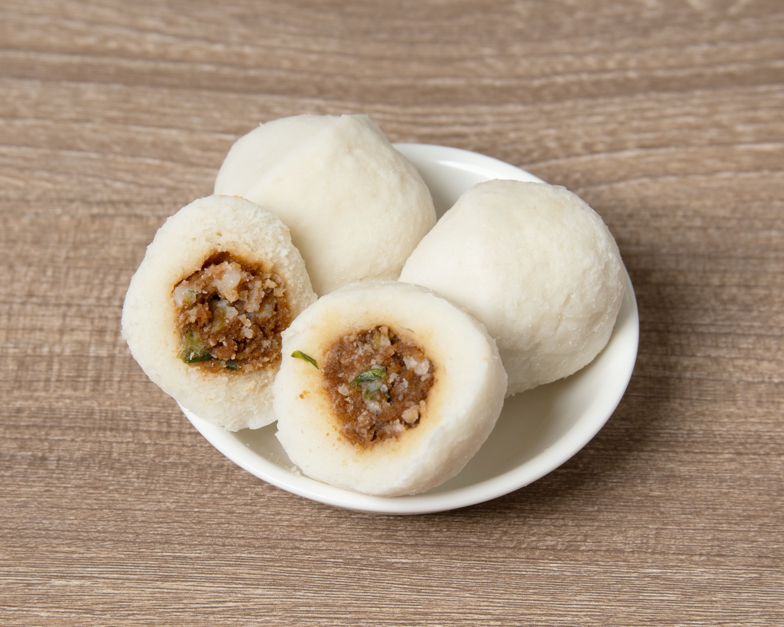 Eel fish balls floating in a fragrant malatang broth