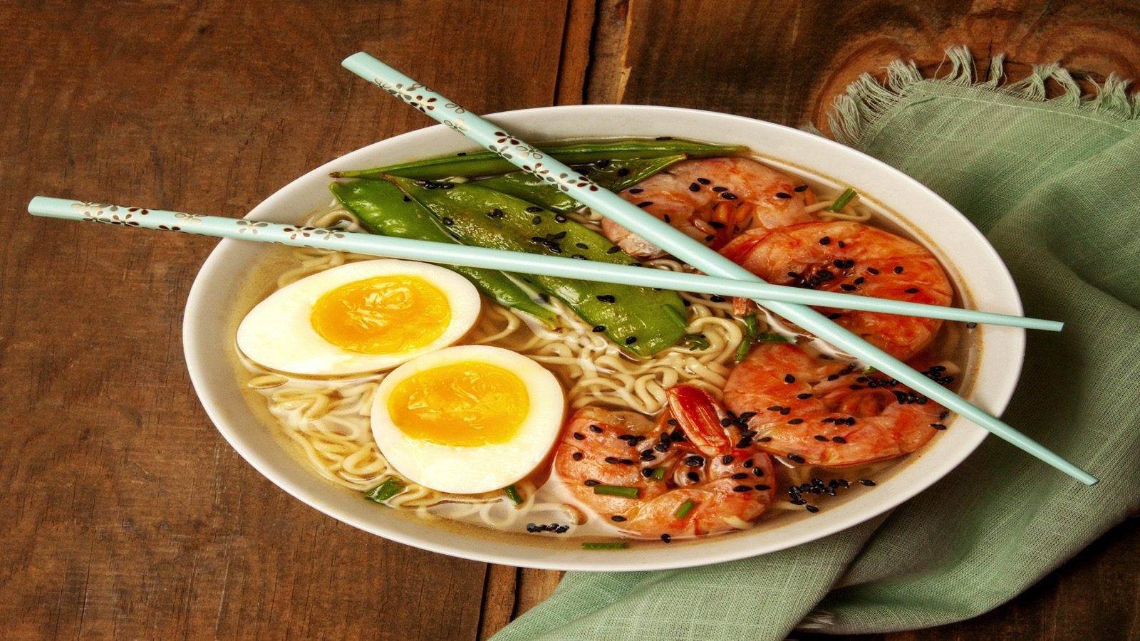Steaming malatang hot pot with rich red broth and fresh vegetables